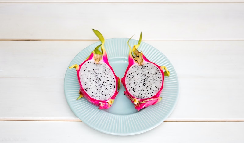 Dragon Fruit | 8 Unusual Chinese Fruits Dragon fruit with vibrant pink skin and white flesh speckled with black seeds, featured as one of 8 unusual Chinese fruits